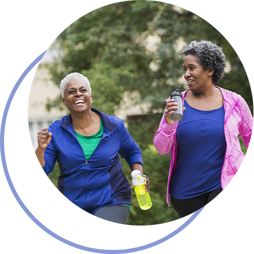 Older African American women exercising outside.